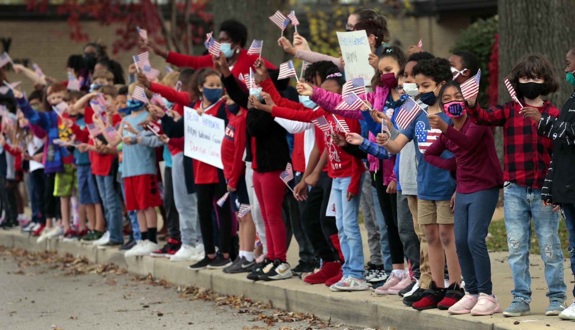 Students honor veterans with drive-by parade